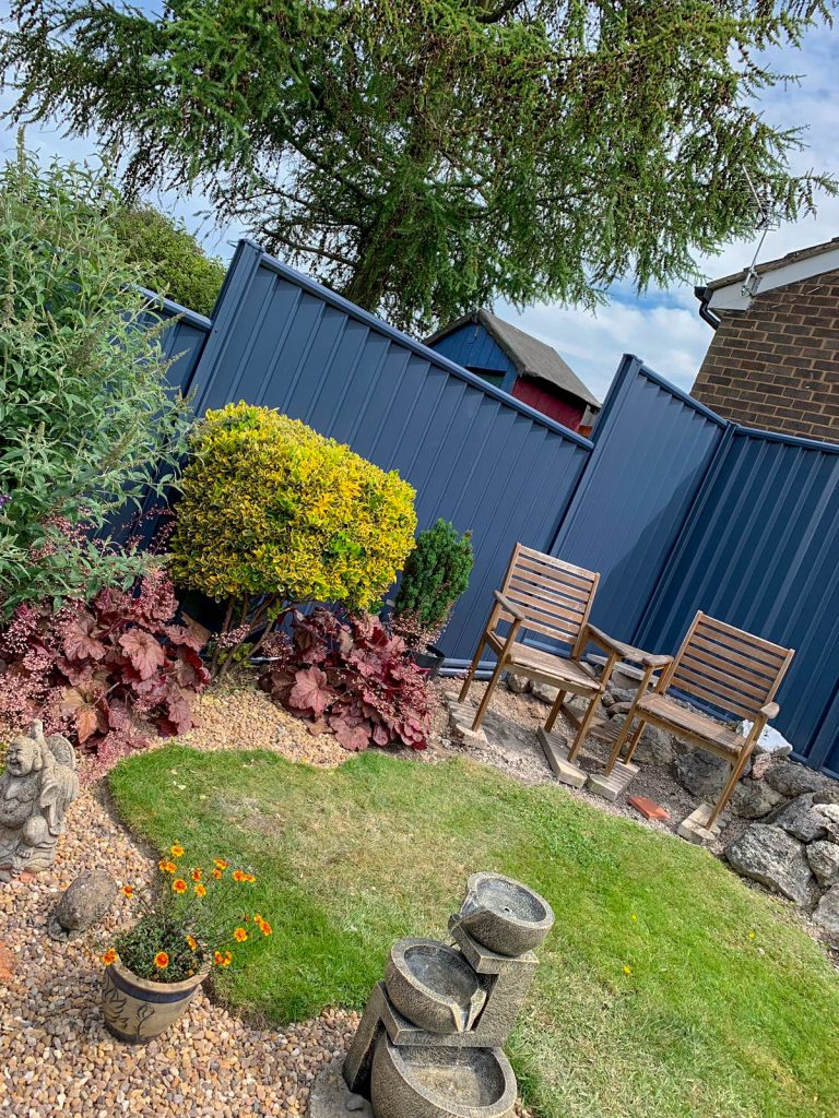 blue fence in garden